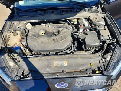 Zdjęcie 11 z 13 samochodu: 2014 FORD FUSION TITANIUM VIN:3FA6P0D99ER348343 - miniatura