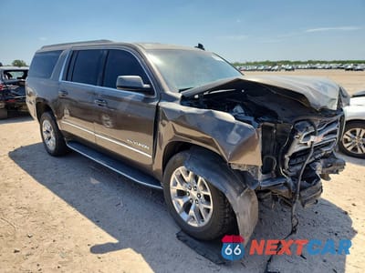 Czwarte zdjęcie samochodu z boku: 2016 GMC YUKON XL C1500 SLE VIN:1GKS1FKC7GR259658 - miniatura