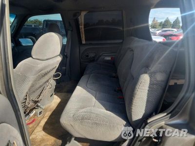 Zdjęcie 10 z 12 samochodu: 1999 CHEVROLET TAHOE K1500 VIN:1GNEK13R7XJ543941 - miniatura