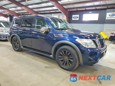 Czwarte zdjęcie samochodu z boku: 2017 NISSAN ARMADA PLATINUM VIN:JN8AY2NC1H9511160 - miniatura