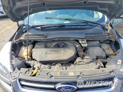 Zdjęcie 11 z 12 samochodu: 2016 FORD ESCAPE TITANIUM VIN:1FMCU9J92GUB55831 - miniatura