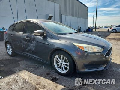 Czwarte zdjęcie samochodu z boku: 2017 FORD FOCUS SE VIN:1FADP3K25HL242120 - miniatura