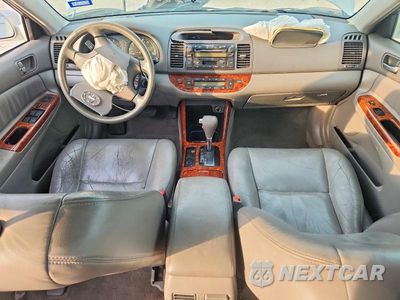 Zdjęcie 8 z 12 samochodu: 2002 TOYOTA CAMRY XLE VIN:JTDBE30K820076050 - miniatura