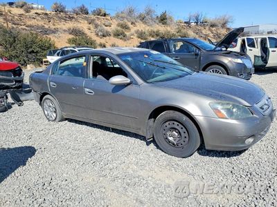 Czwarte zdjęcie samochodu z boku: 2005 NISSAN ALTIMA 2.5 VIN:1N4AL11D15N928015 - miniatura
