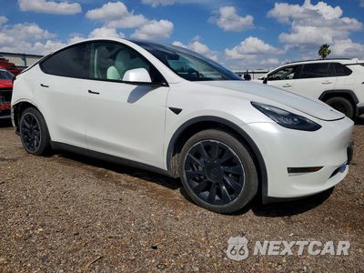 Czwarte zdjęcie samochodu z boku: 2021 TESLA MODEL Y VIN:5YJYGDEE2MF256321 - miniatura