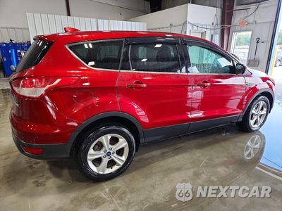 Trzecie zdjęcie samochodu z tyłu: 2014 FORD ESCAPE SE VIN:1FMCU0G98EUA04265 - miniatura