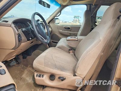 Zdjęcie 7 z 12 samochodu: 1999 FORD F150 VIN:1FTRX07LXXKC01728 - miniatura
