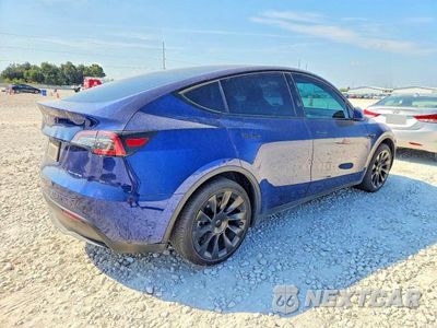 Trzecie zdjęcie samochodu z tyłu: 2023 TESLA MODEL Y VIN:7SAYGAEE0PF665195 - miniatura