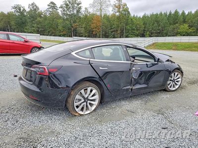 Trzecie zdjęcie samochodu z tyłu: 2018 TESLA MODEL 3 VIN:5YJ3E1EA7JF036468 - miniatura