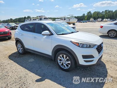 Czwarte zdjęcie samochodu z boku: 2019 HYUNDAI TUCSON SE VIN:KM8J23A41KU055484 - miniatura