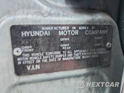 Zdjęcie 12 z 12 samochodu: 2002 HYUNDAI SONATA BASE VIN:KMHWF25S32A681777 - miniatura