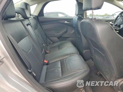 Zdjęcie 10 z 12 samochodu: 2017 FORD FOCUS TITANIUM VIN:1FADP3J21HL280011 - miniatura