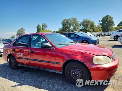 Czwarte zdjęcie samochodu z boku: 1999 HONDA CIVIC LX VIN:1HGEJ6678XL001983 - miniatura