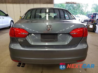 Zdjęcie 6 z 12 samochodu: 2014 VOLKSWAGEN JETTA BASE VIN:3VW1K7AJ1EM370650 - miniatura