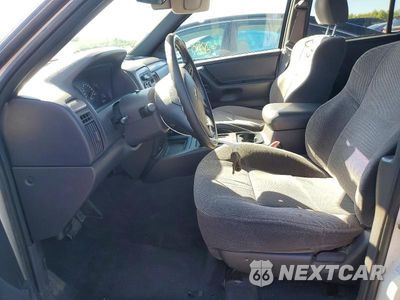 Zdjęcie 7 z 13 samochodu: 2001 JEEP GRAND CHEROKEE LAREDO VIN:1J4GW48S91C527569 - miniatura
