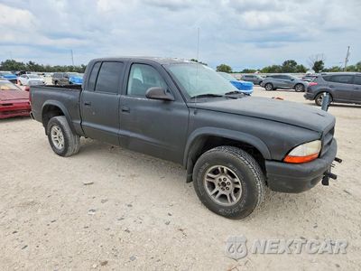 Czwarte zdjęcie samochodu z boku: 2002 DODGE DAKOTA QUAD SPORT VIN:1B7HG38N72S659166 - miniatura