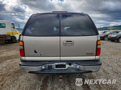 Zdjęcie 6 z 13 samochodu: 2002 GMC YUKON XL K1500 VIN:1GKFK16Z12J131570 - miniatura