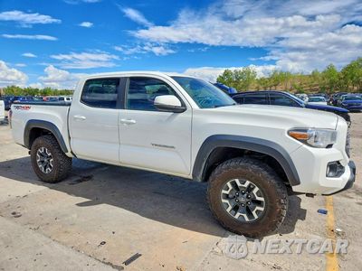 Czwarte zdjęcie samochodu z boku: 2021 TOYOTA TACOMA TRD OFF-ROAD VIN:3TMCZ5ANXMM435492 - miniatura