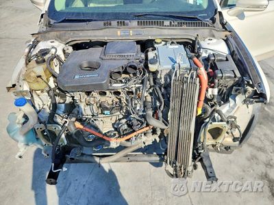 Zdjęcie 11 z 12 samochodu: 2014 FORD FUSION SE HYBRID VIN:3FA6P0LU3ER140125 - miniatura