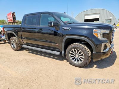 Czwarte zdjęcie samochodu z boku: 2019 GMC SIERRA K1500 AT4 VIN:1GTP9EEL3KZ150610 - miniatura
