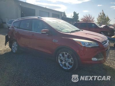 Czwarte zdjęcie samochodu z boku: 2016 FORD ESCAPE TITANIUM VIN:1FMCU9JX1GUB16727 - miniatura