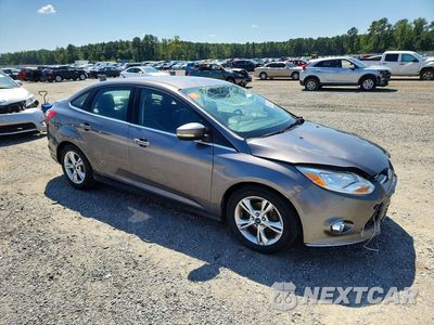Czwarte zdjęcie samochodu z boku: 2014 FORD FOCUS TITANIUM VIN:1FADP3J26EL399958 - miniatura
