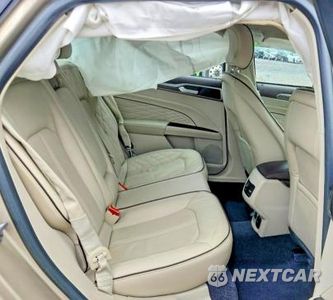 Zdjęcie 10 z 12 samochodu: 2017 FORD FUSION TITANIUM VIN:3FA6P0K95HR186184 - miniatura