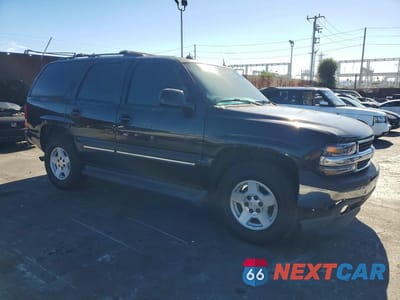 Czwarte zdjęcie samochodu z boku: 2005 CHEVROLET TAHOE C1500 VIN:1GNEC13T45R275759 - miniatura