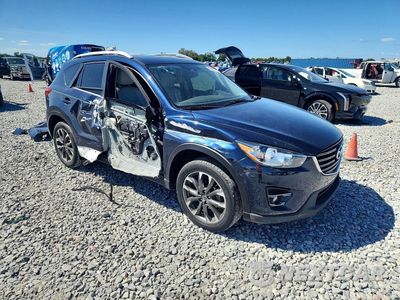 Czwarte zdjęcie samochodu z boku: 2016 MAZDA CX-5 GT VIN:JM3KE2DY3G0786531 - miniatura