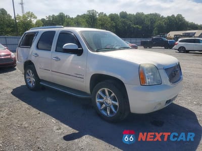 Czwarte zdjęcie samochodu z boku: 2011 GMC YUKON DENALI VIN:1GKS2EEF2BR181277 - miniatura