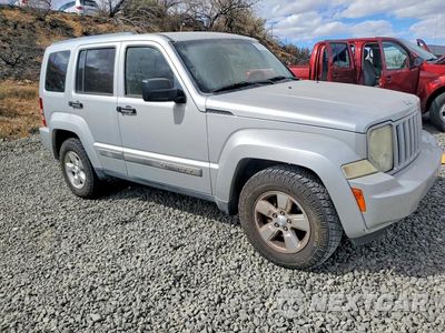 Czwarte zdjęcie samochodu z boku: 2012 JEEP LIBERTY SPORT VIN:1C4PJMAK7CW209837 - miniatura