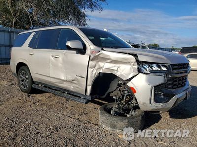 Czwarte zdjęcie samochodu z boku: 2021 CHEVROLET TAHOE K1500 Z71 VIN:1GNSKPKD3MR394548 - miniatura