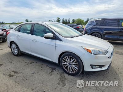 Czwarte zdjęcie samochodu z boku: 2018 FORD FOCUS TITANIUM VIN:1FADP3J2XJL252889 - miniatura