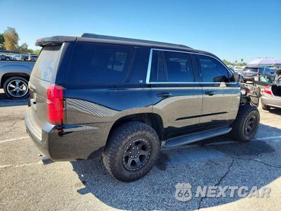 Trzecie zdjęcie samochodu z tyłu: 2017 CHEVROLET TAHOE C1500 LT VIN:1GNSCBKC6HR187715 - miniatura