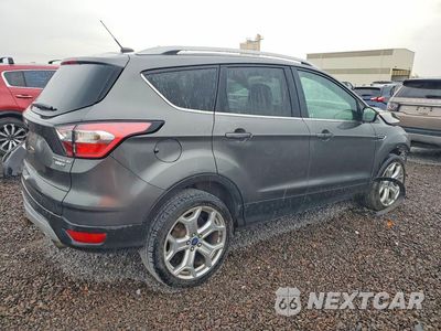 Trzecie zdjęcie samochodu z tyłu: 2017 FORD ESCAPE TITANIUM VIN:1FMCU9J99HUB66763 - miniatura