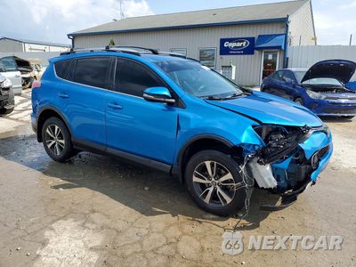 Czwarte zdjęcie samochodu z boku: 2017 TOYOTA RAV4 XLE VIN:JTMWFREVXHJ104518 - miniatura