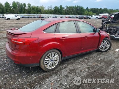Trzecie zdjęcie samochodu z tyłu: 2015 FORD FOCUS TITANIUM VIN:1FADP3J24FL273681 - miniatura