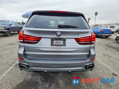 Zdjęcie 6 z 13 samochodu: 2014 BMW X5 XDRIVE35I VIN:5UXKR0C59E0C26469 - miniatura