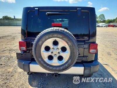 Zdjęcie 6 z 12 samochodu: 2015 JEEP WRANGLER UNLIMITED SAHARA VIN:1C4BJWEG7FL732776 - miniatura