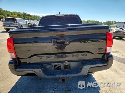 Zdjęcie 6 z 13 samochodu: 2017 TOYOTA TACOMA SR5 V6 VIN:3TMAZ5CN1HM026579 - miniatura