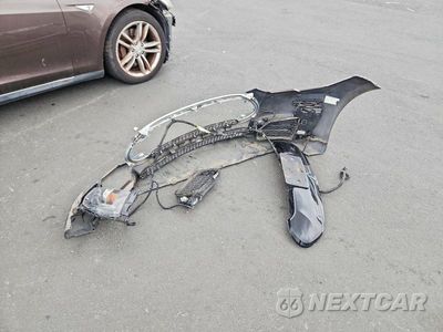 Zdjęcie 12 z 13 samochodu: 2014 TESLA MODEL S VIN:5YJSA1S17EFP29414 - miniatura