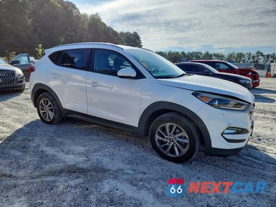 Czwarte zdjęcie samochodu z boku: 2016 HYUNDAI TUCSON ECO VIN:KM8J3CA24GU138927 - miniatura