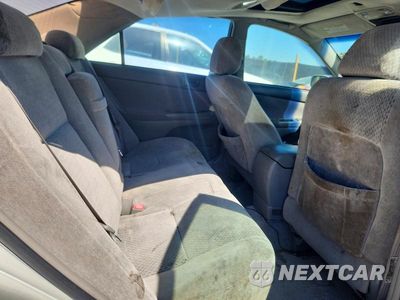 Zdjęcie 10 z 13 samochodu: 2004 TOYOTA CAMRY LE V6 VIN:4T1BF32K94U069772 - miniatura