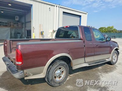 Trzecie zdjęcie samochodu z tyłu: 2001 FORD F150 VIN:1FTRX17L51NA27935 - miniatura
