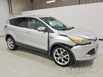 Czwarte zdjęcie samochodu z boku: 2015 FORD ESCAPE TITANIUM VIN:1FMCU0JX6FUB36613 - miniatura