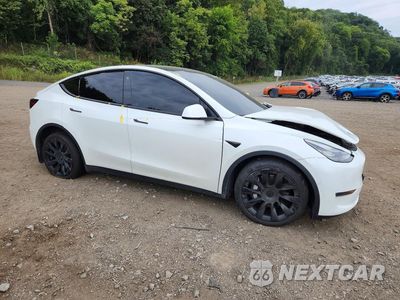Czwarte zdjęcie samochodu z boku: 2022 TESLA MODEL Y VIN:7SAYGAEE2NF516395 - miniatura