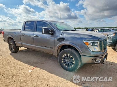 Czwarte zdjęcie samochodu z boku: 2018 NISSAN TITAN XD PRO-4X VIN:1N6AA1F49JN521429 - miniatura