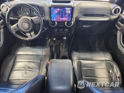 Zdjęcie 8 z 12 samochodu: 2012 JEEP WRANGLER UNLIMITED SAHARA VIN:1C4BJWEG3CL176221 - miniatura