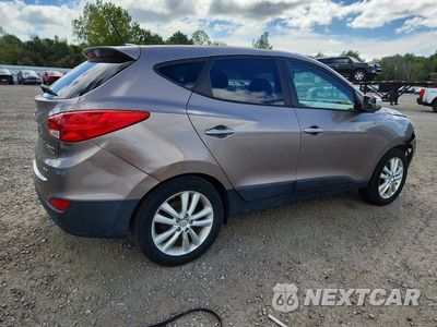 Trzecie zdjęcie samochodu z tyłu: 2012 HYUNDAI TUCSON LIMITED VIN:KM8JUCAC2CU371186 - miniatura
