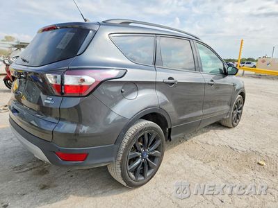 Trzecie zdjęcie samochodu z tyłu: 2018 FORD ESCAPE SE VIN:1FMCU9GD6JUC87204 - miniatura